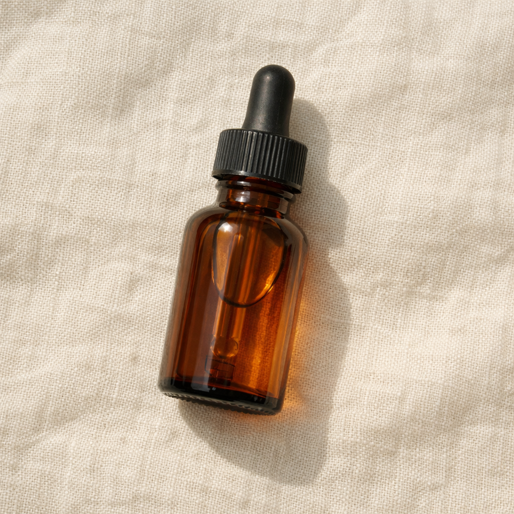 Oil nº 1 bottle on cream linen
